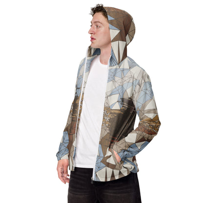 Person wearing a geometric patterned windbreaker on a white background