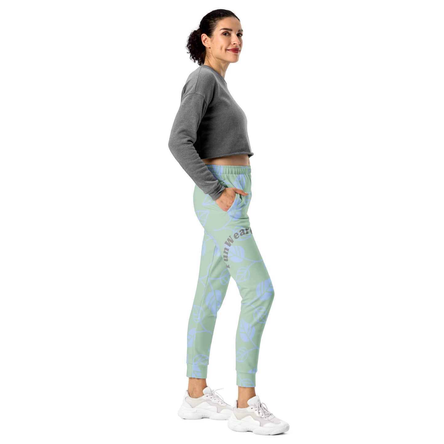 Woman wearing a gray sweatshirt and light blue leggings with a pattern and 'Fun Wear Code' text logo on a white background