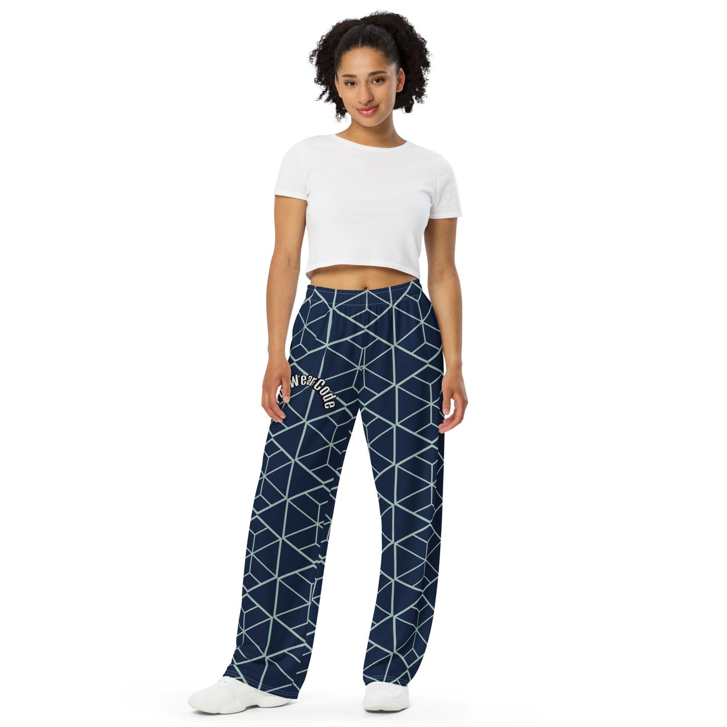 Woman wearing navy blue pants with white geometric pattern and a 'Fun Wear Code' text logo on a white background