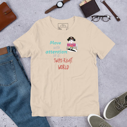 Beige t-shirt with a playful geisha graphic design and text on a gray surface with jeans, shoes, and accessories.